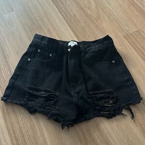 Black mini shorts with rips